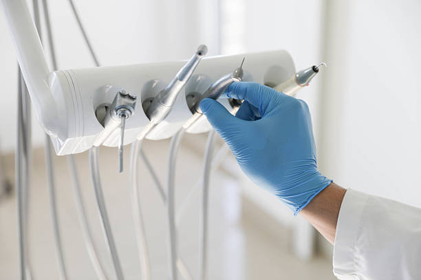 Professional Dental Veneers technician working in Lake Belvedere Estates, FL